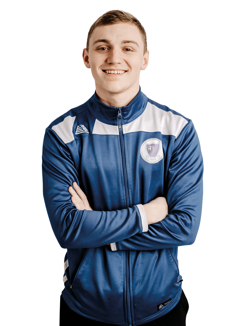 Male student smiling at camera