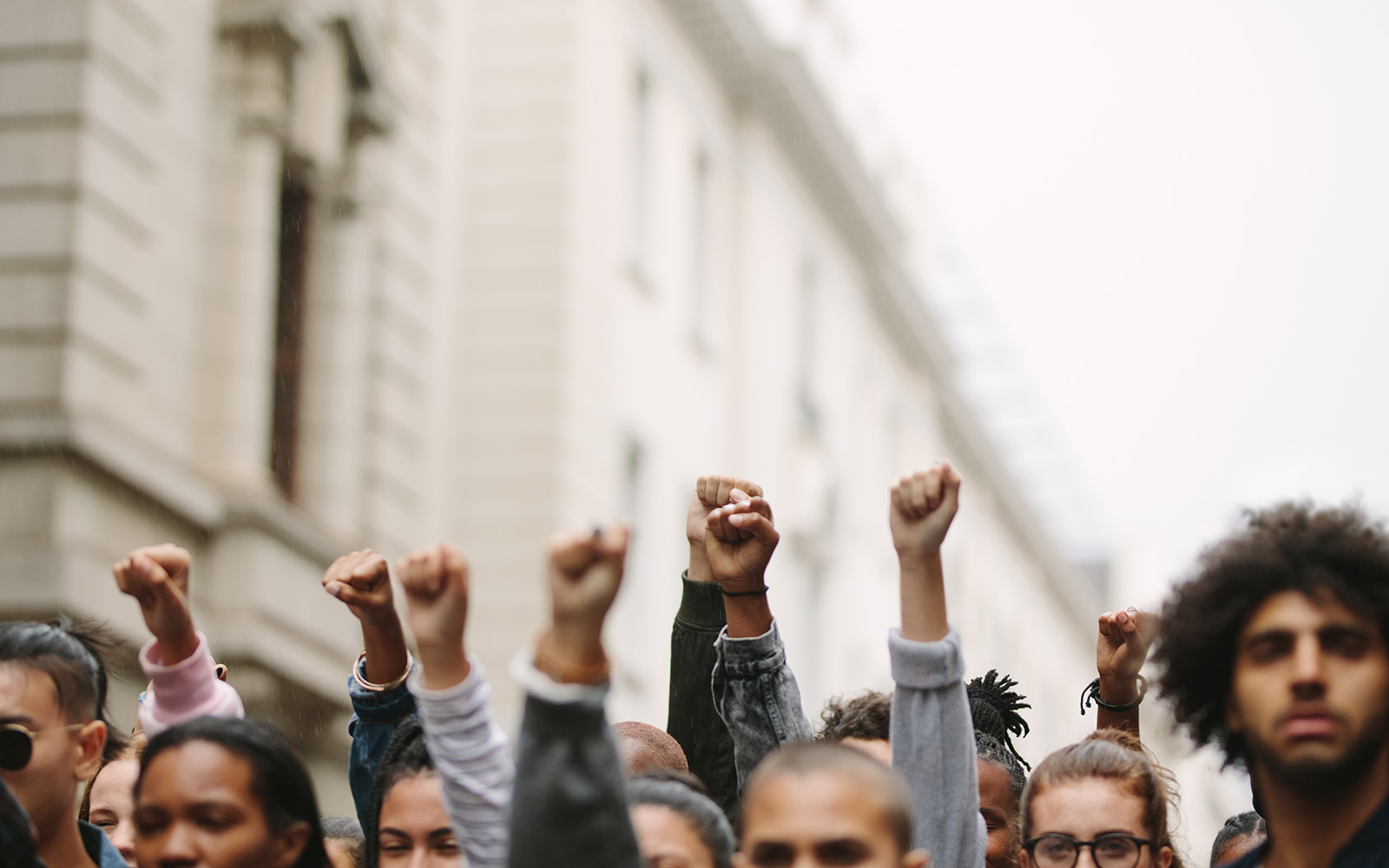 Group of people with fists raised