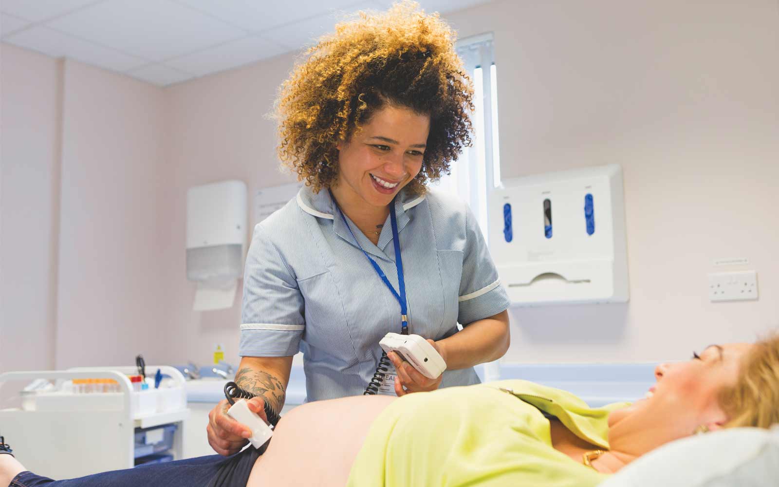 Midwifery student doing ultrasound.