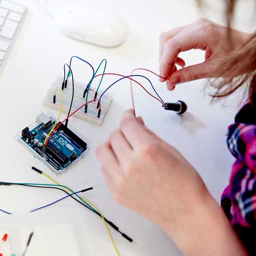 Student working with electronics