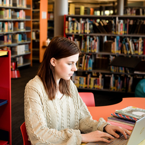 Student on laptop in Library