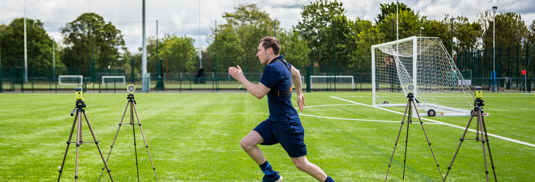 Student running at Haxby Road sports facilities