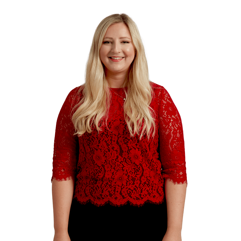 Female postgraduate student, blonde hair, red top, smiling at the camera